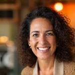 Portrait of Maria Flores, Head of Community & Wellness Coaching